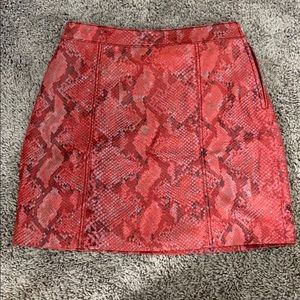 Red snake skin skirt